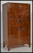 A vintage 20th Century 1930's Art Deco walnut cocktail cabinet / bar with appointed interior to