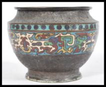 An early 20th century Japanese Cloisonne bowl vase raised on circular base with a band of