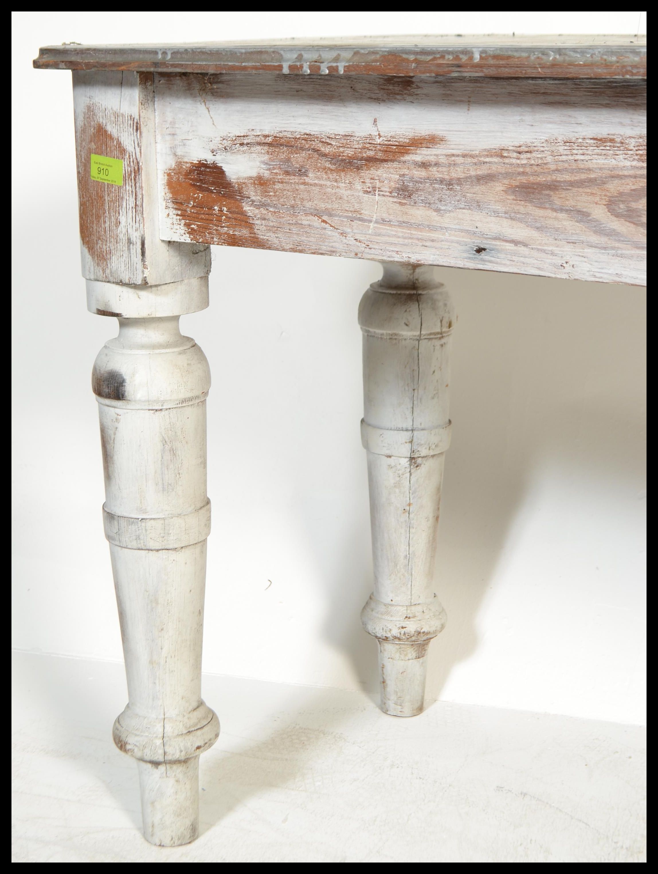 A 20th century shabby chic long refectory painted dining / skullery table. Raised on turned legs - Image 5 of 5