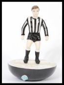 A Royal Doulton Subbuteo ceramic football figurine