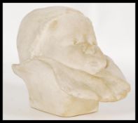 A 19th century French infants head cast in plaster numbered 362 to the rear base, please see images.