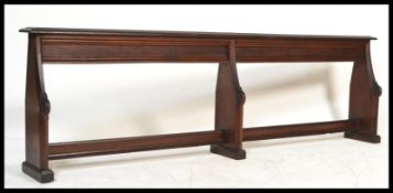 A 19th century Victorian arts and crafts oak ecclesiastical  church pew having carved grape and vine