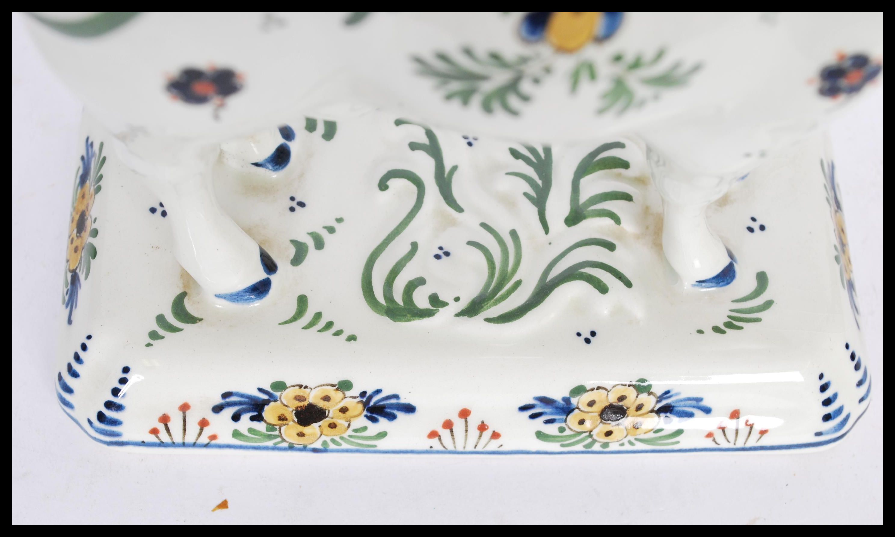 A 19th / 20th Century Delft ceramic figurine of a cow having hand painted floral sprays with painted - Image 7 of 8