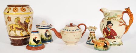 A group of 20th century ceramics to include a SylvaC vase featuring griffin motifs and floral