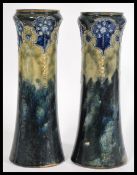 A pair of  tall 19th century Art Nouveau tapering vases with a green and cobalt blue glaze with a