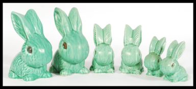 A selection of vintage 20th century graduating SylvaC green rabbits including numbers 1026, 990