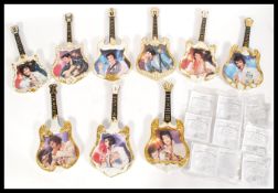 A collection of 21st century Elvis Presley Bradford Exchange guitar form limited edition wall plates