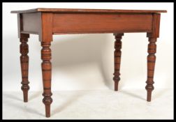 A 19th Century Victorian mahogany side / hall table, rectangular top raised on turned supports.
