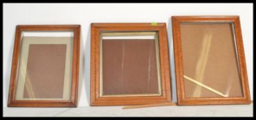 A selection of three maple picture frames with molded shaping and glazing. Please see images for