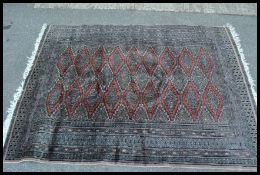 A vintage woven floor rug.