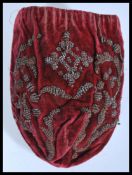 A late 17th century silk ladies drawstring coin pu