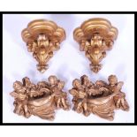A collection of plaster gold painted wall plaques