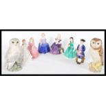 A group of seven Royal Doulton ceramic figures to