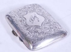 An early 20th century silver hinged cigarette case