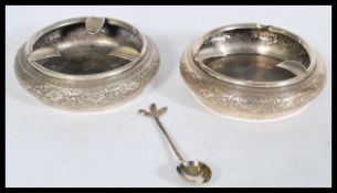 A pair of Persian Islamic ashtrays of bulbous form