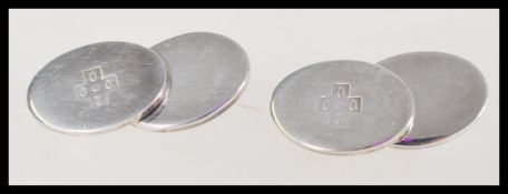 A pair of 20th century boxed silver cuff links mar