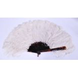 A vintage early 20th century ostrich feather and t