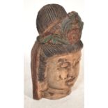 A 20th Century large carved wooden bust / head mod
