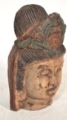 A 20th Century large carved wooden bust / head mod
