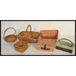 A group of vintage wicker baskets and hampers of s