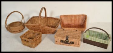 A group of vintage wicker baskets and hampers of s
