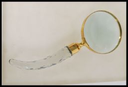 A 20th century large brass cased magnifying glass