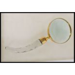 A 20th century large brass cased magnifying glass