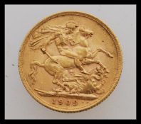 An Edwardian 1909 golden London Mint sovereign inc