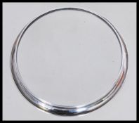 An Art Deco silver hallmarked and glass coaster ha