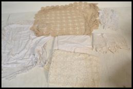 A collection of vintage linens to include, a croch