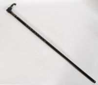 A vintage early 20th century African ebony and ivo