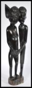 A west African polished wood fertility sculpture d