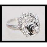 A vintage 20th century diamond and white metal sta