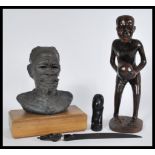 A group of vintage 20th century carved African war