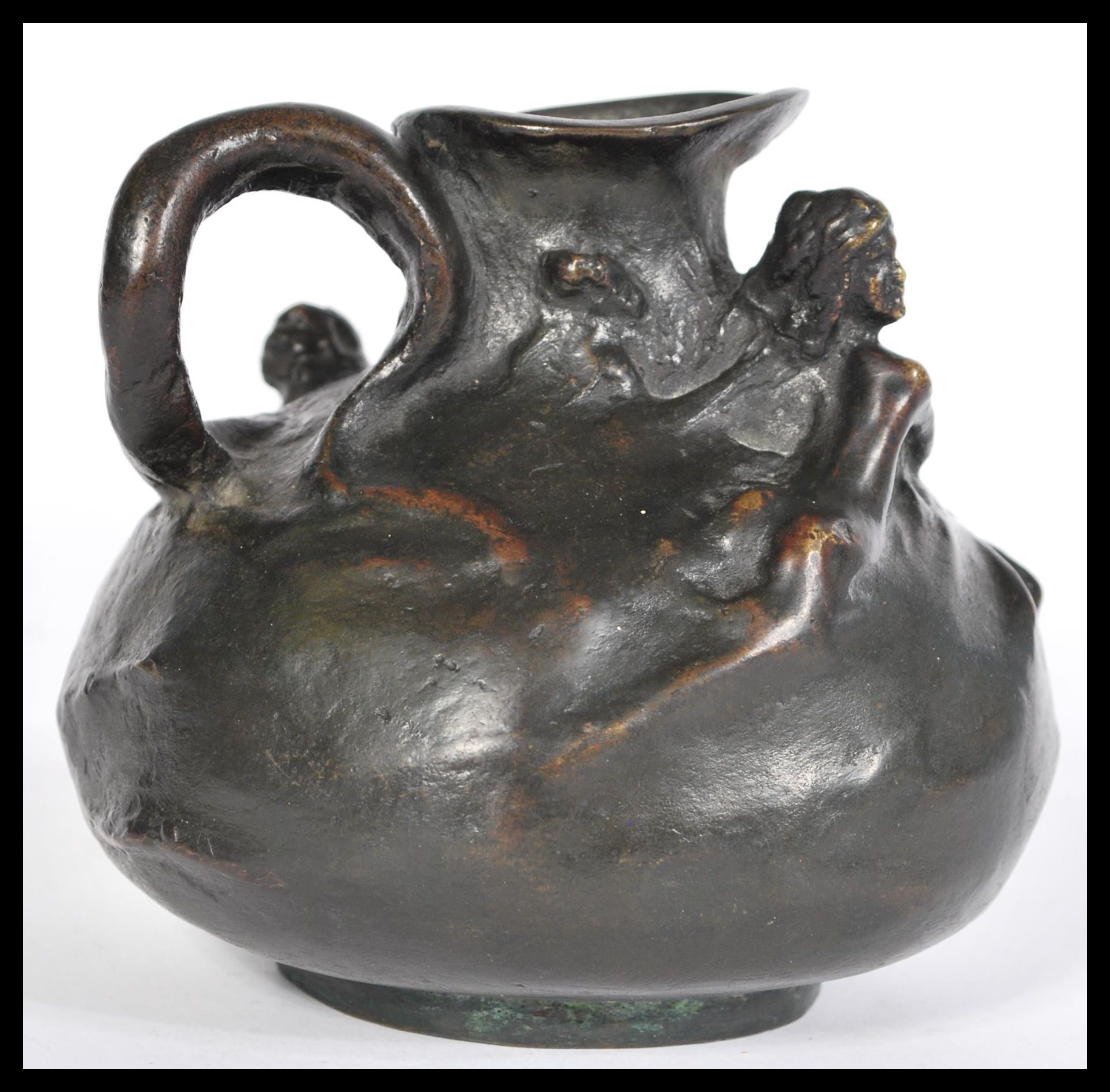 A 19th century Art Nouveau bronze ewer jug having - Image 3 of 5