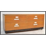 A vintage 20th Century four drawer beech wood arch