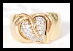 A contemporary hallmarked 18ct gold ring having a