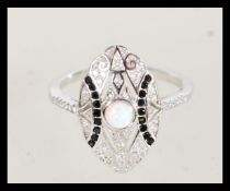 A 20th century art deco style silver ring with an