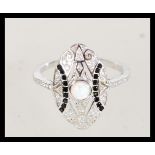 A 20th century art deco style silver ring with an