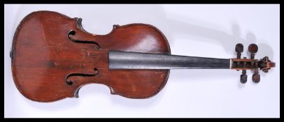 A 20th century violin with hollow body, a scrolled