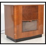 A vintage Art Deco walnut cased radiogram, fitted