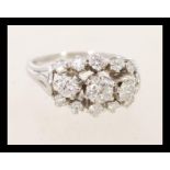 A fantastic 18ct white gold thirteen stone diamond