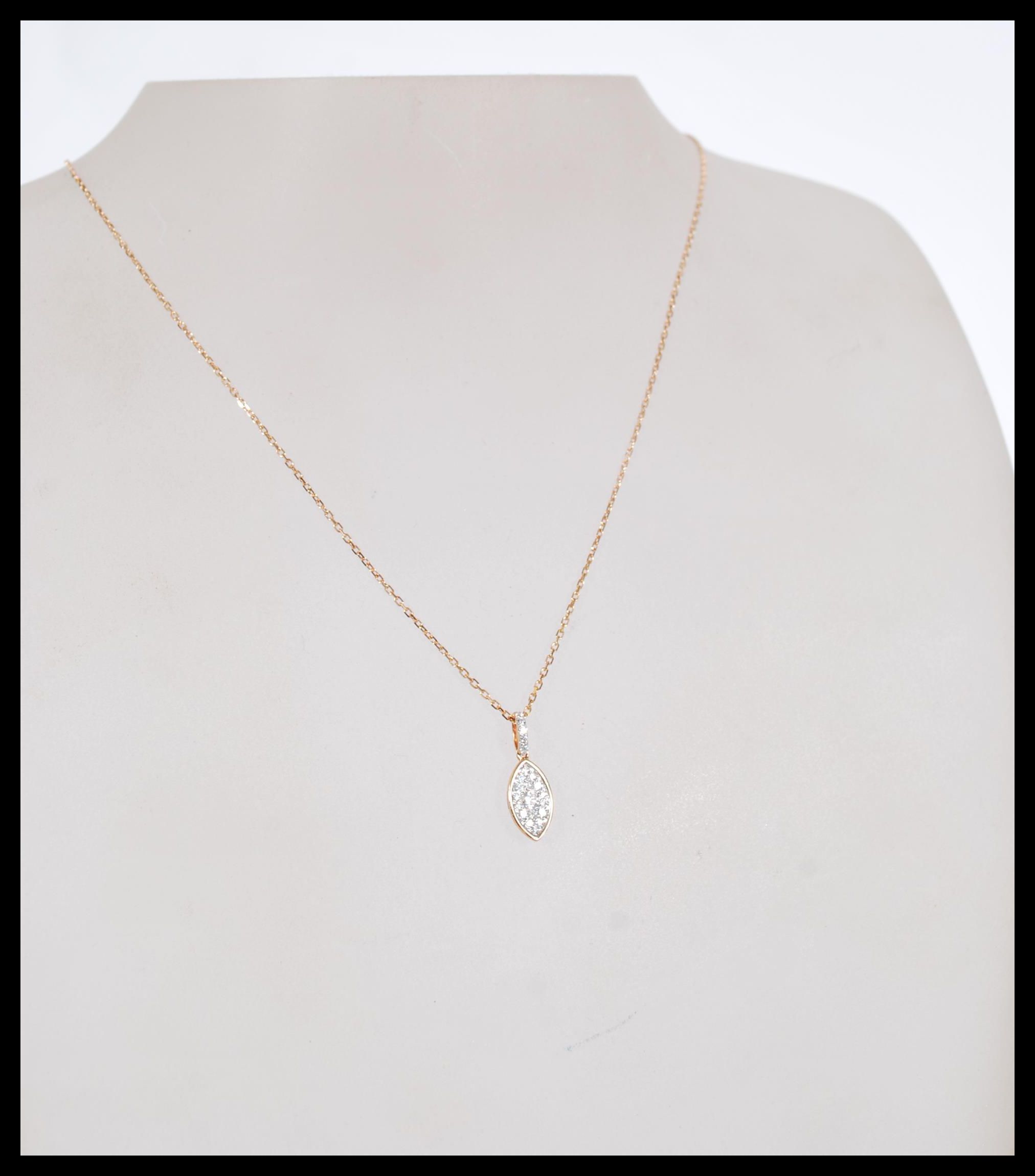 An 19ct rose gold and diamond pendant necklace hav