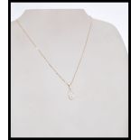 An 19ct rose gold and diamond pendant necklace hav