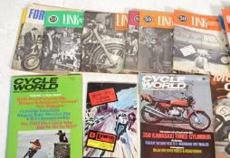 A collection of vintage motorcycle magazines and p