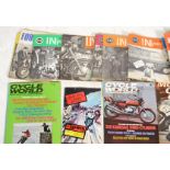 A collection of vintage motorcycle magazines and p