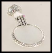 A 20th century vintage silver miniature magnifying