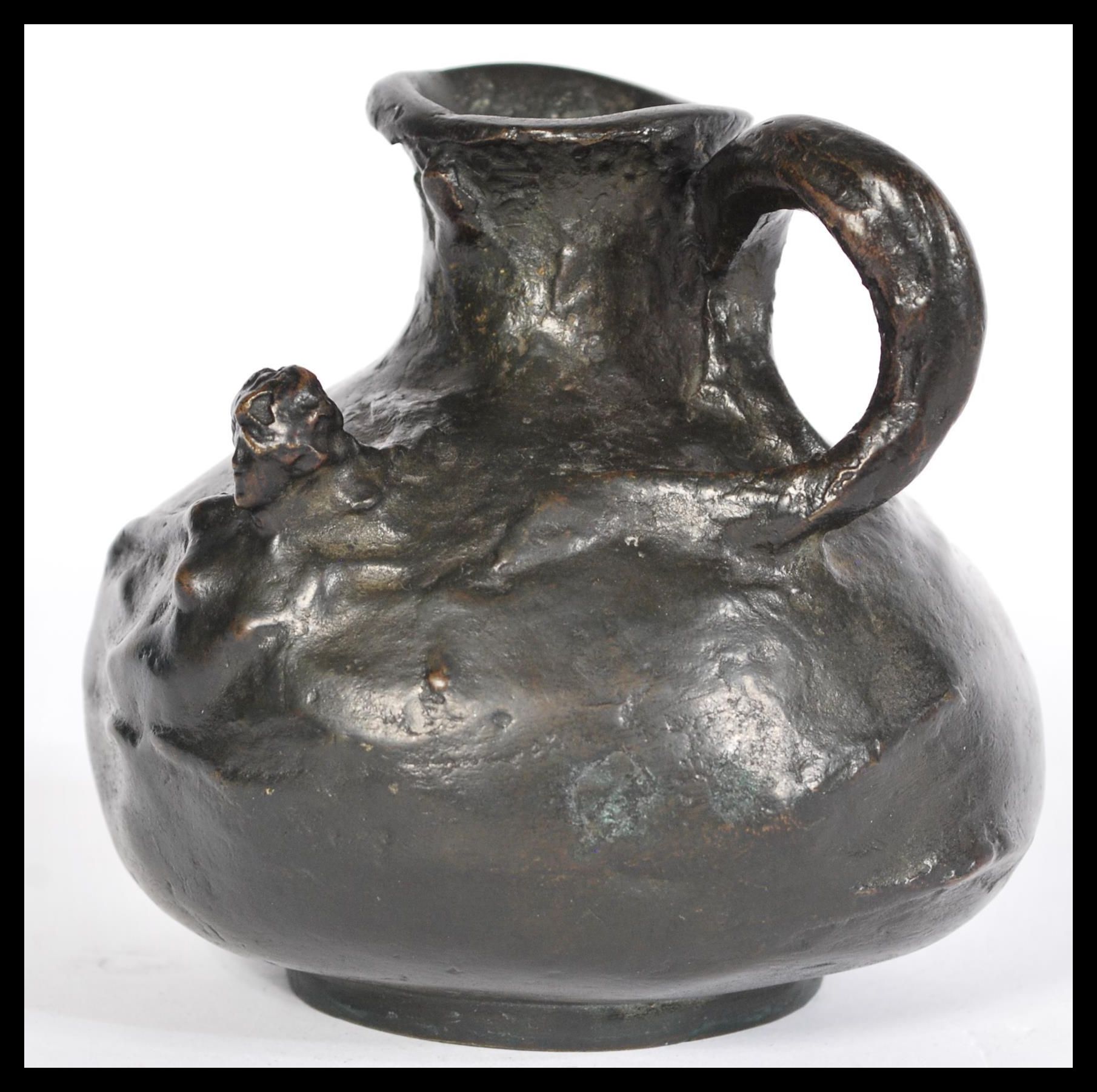 A 19th century Art Nouveau bronze ewer jug having - Image 2 of 5