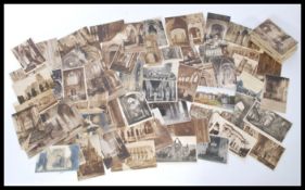 A collection of early 20th century postcards of ec