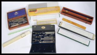 A collection of Draughtsman's tools to include a W. H. Harling Mathematical Instrument  set,